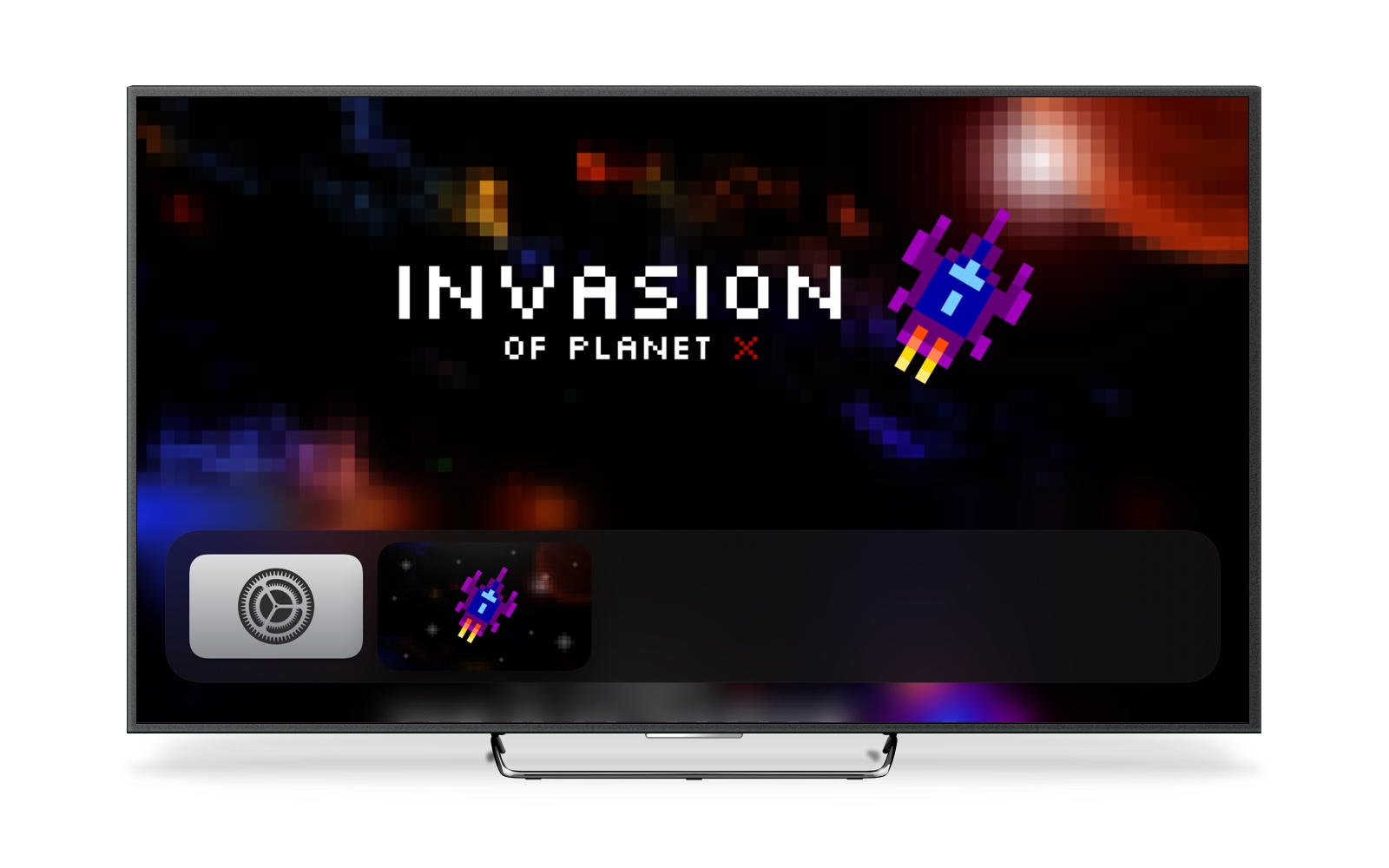 An image of a TV displaying the home screen of an Apple TV. On the screen, there is an app icon to launch Invasion of Planet X.
